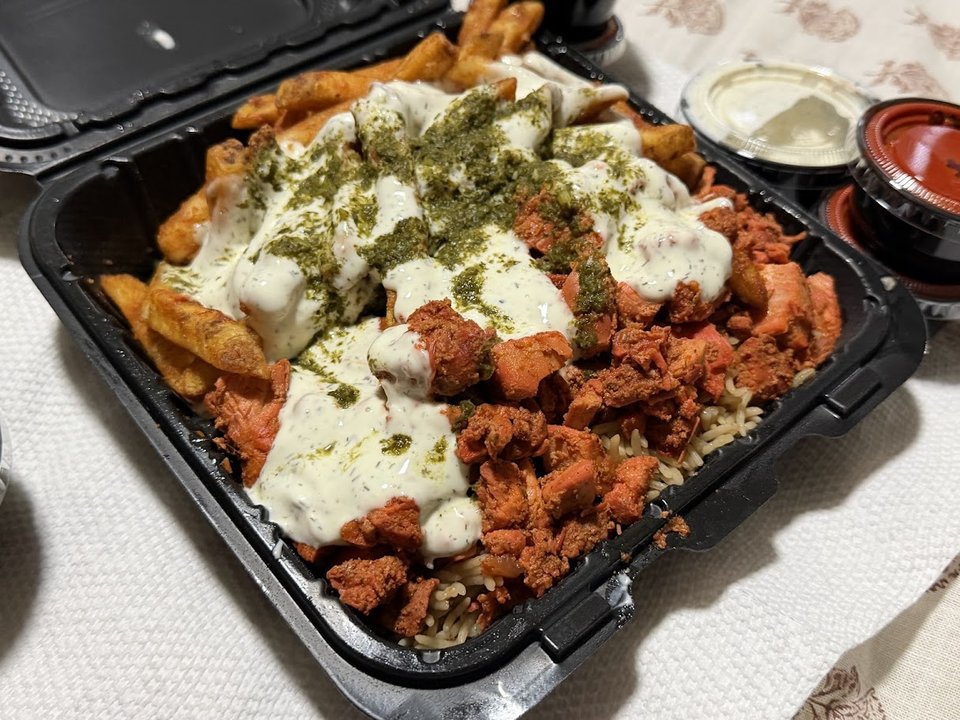 Takeout counter with packaged meals.