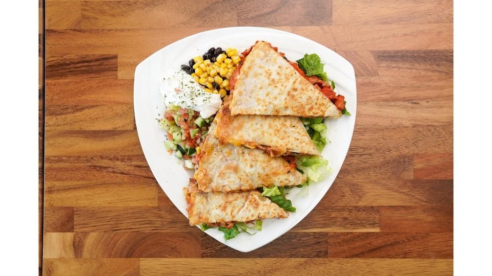 Printed menu with platters and wraps.