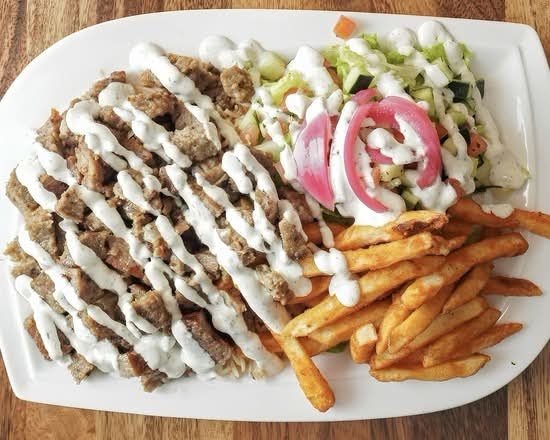 Menu board listing gyros and burgers.